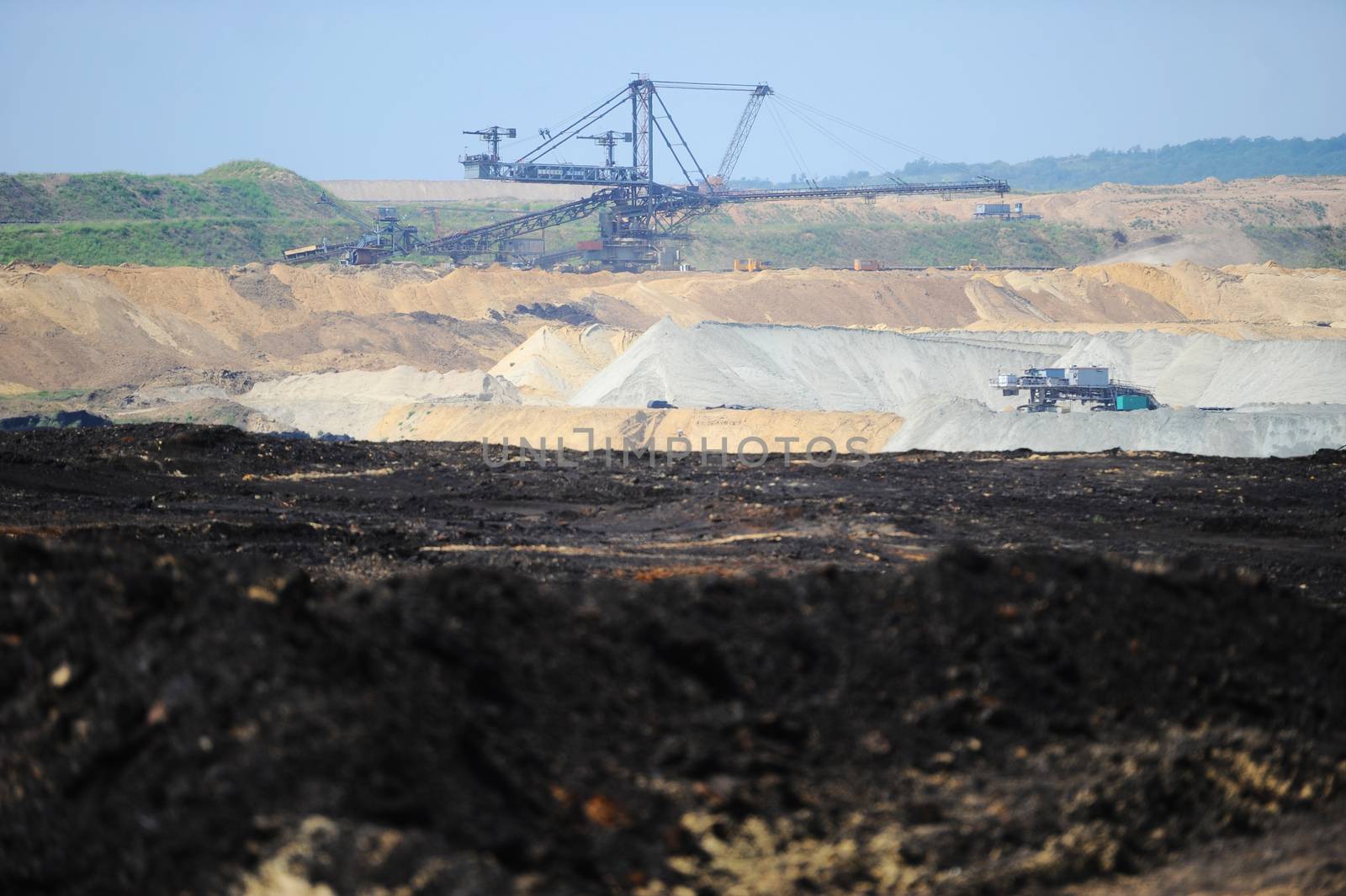 View on large surface coal mine on sunny day