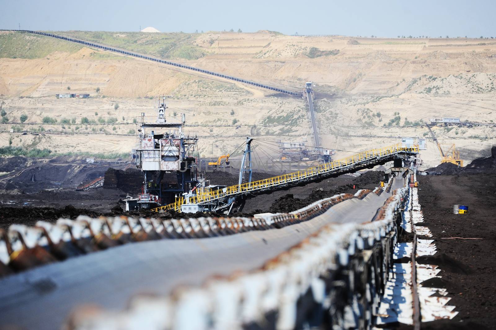 View on large surface coal mine on sunny day