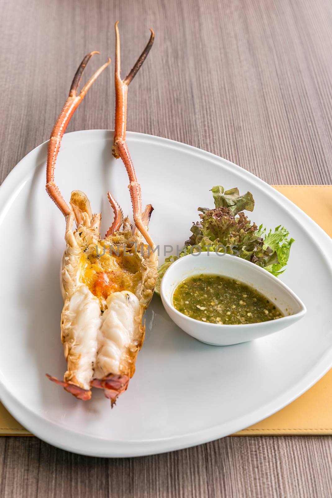 Grilled mighty tiger river prawn with spicy sauce and lettuce