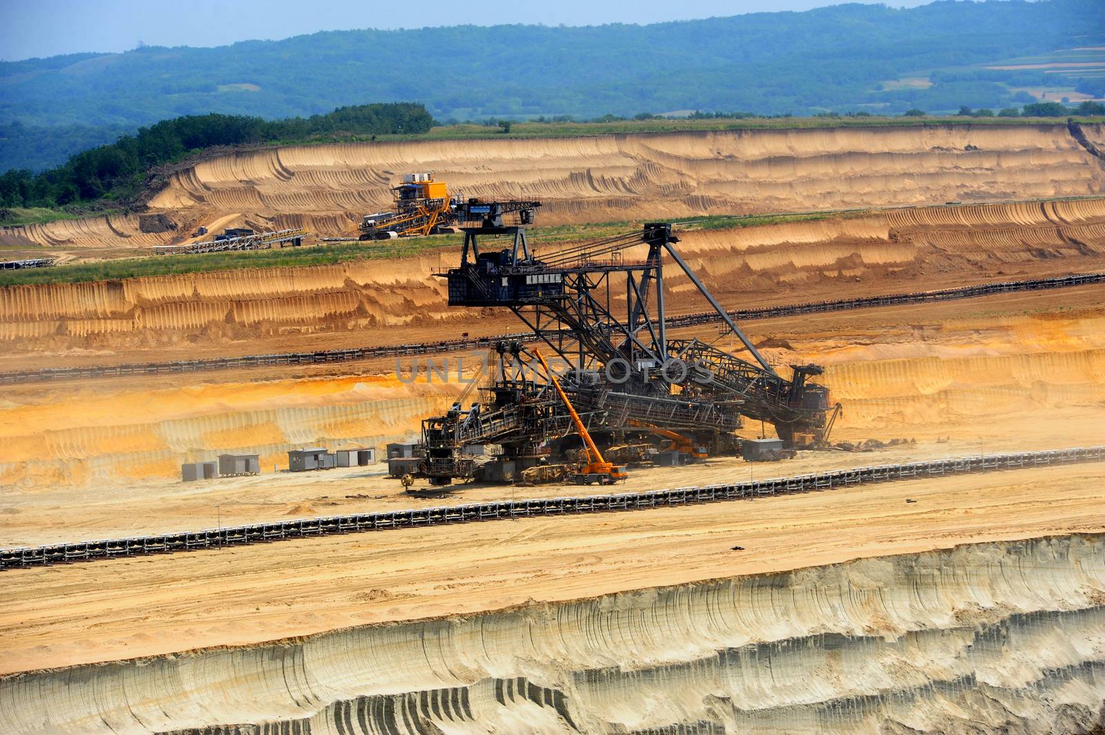 View on large surface coal mine on sunny day