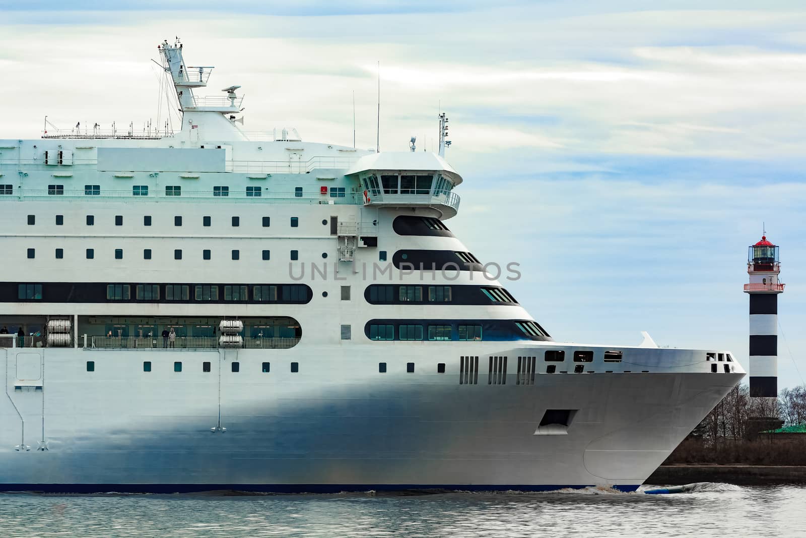 White cruise liner sailing on a clear day