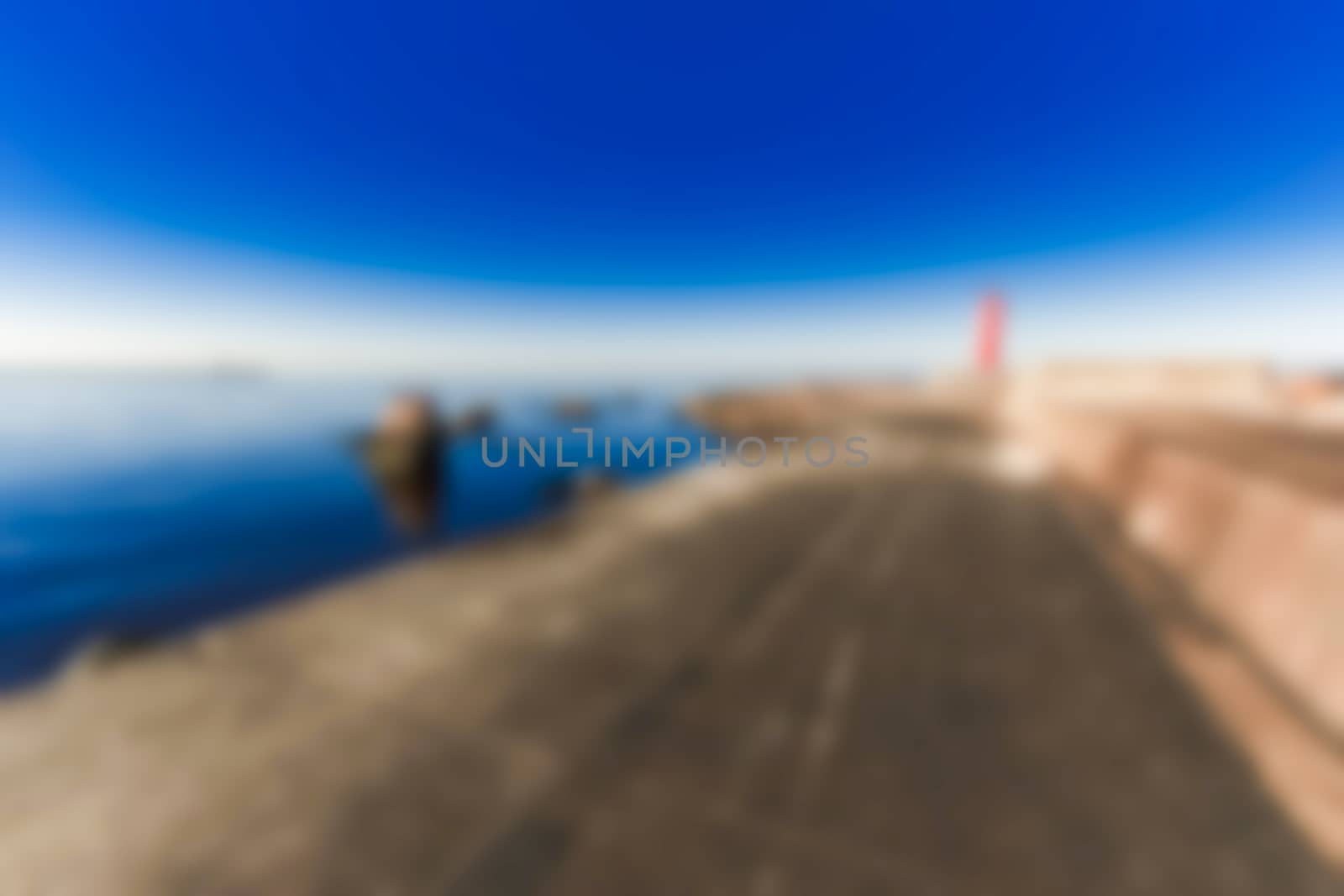 Red lighthouse - soft lens bokeh image. Defocused background