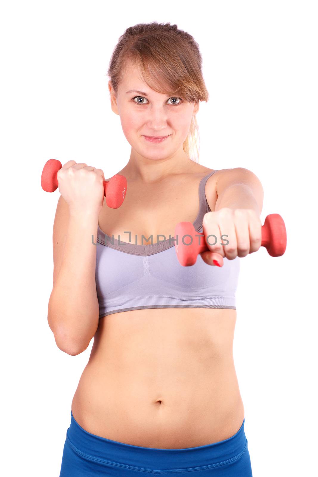 The girl goes in for sports with dumbbells on a white background.