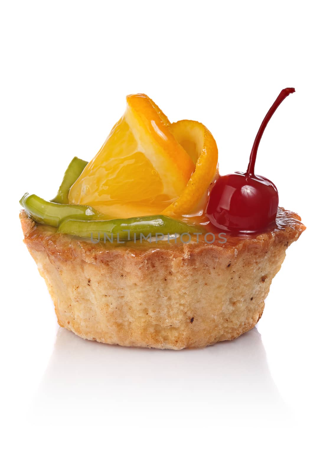 Delicious cake with orange and cherry on a white background.