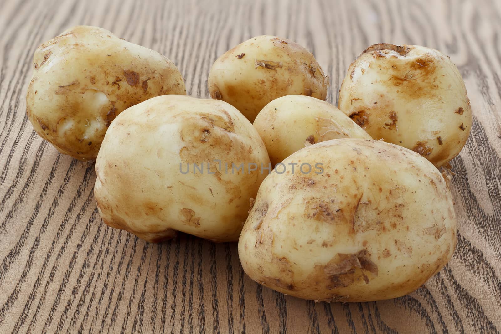Heap of raw potato by baronvsp