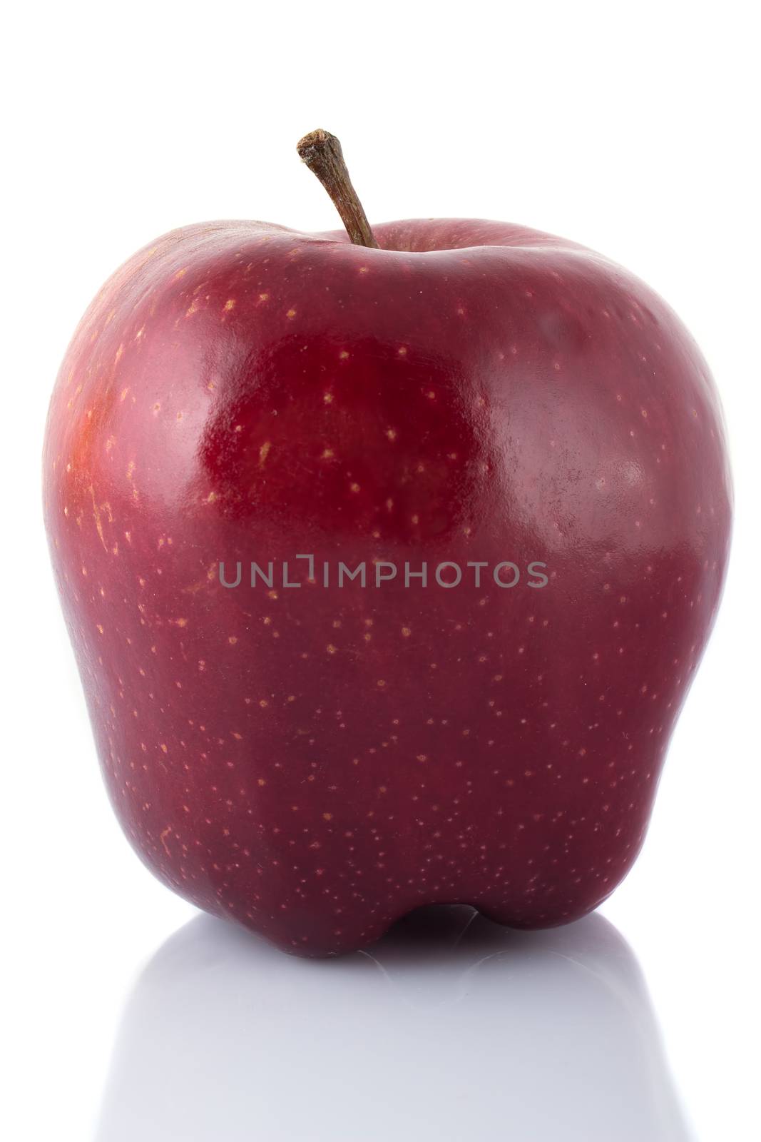 Juicy red apple isolated on a white background.