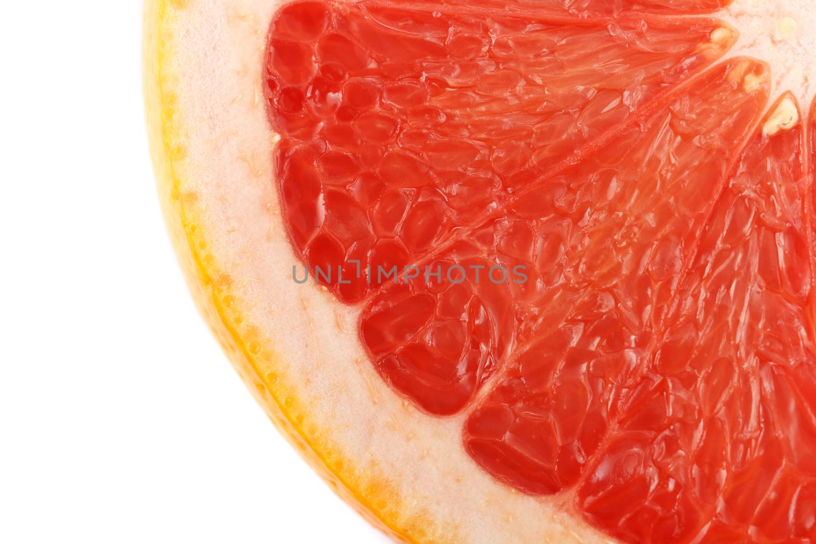 Half of fresh grapefruit on white background.