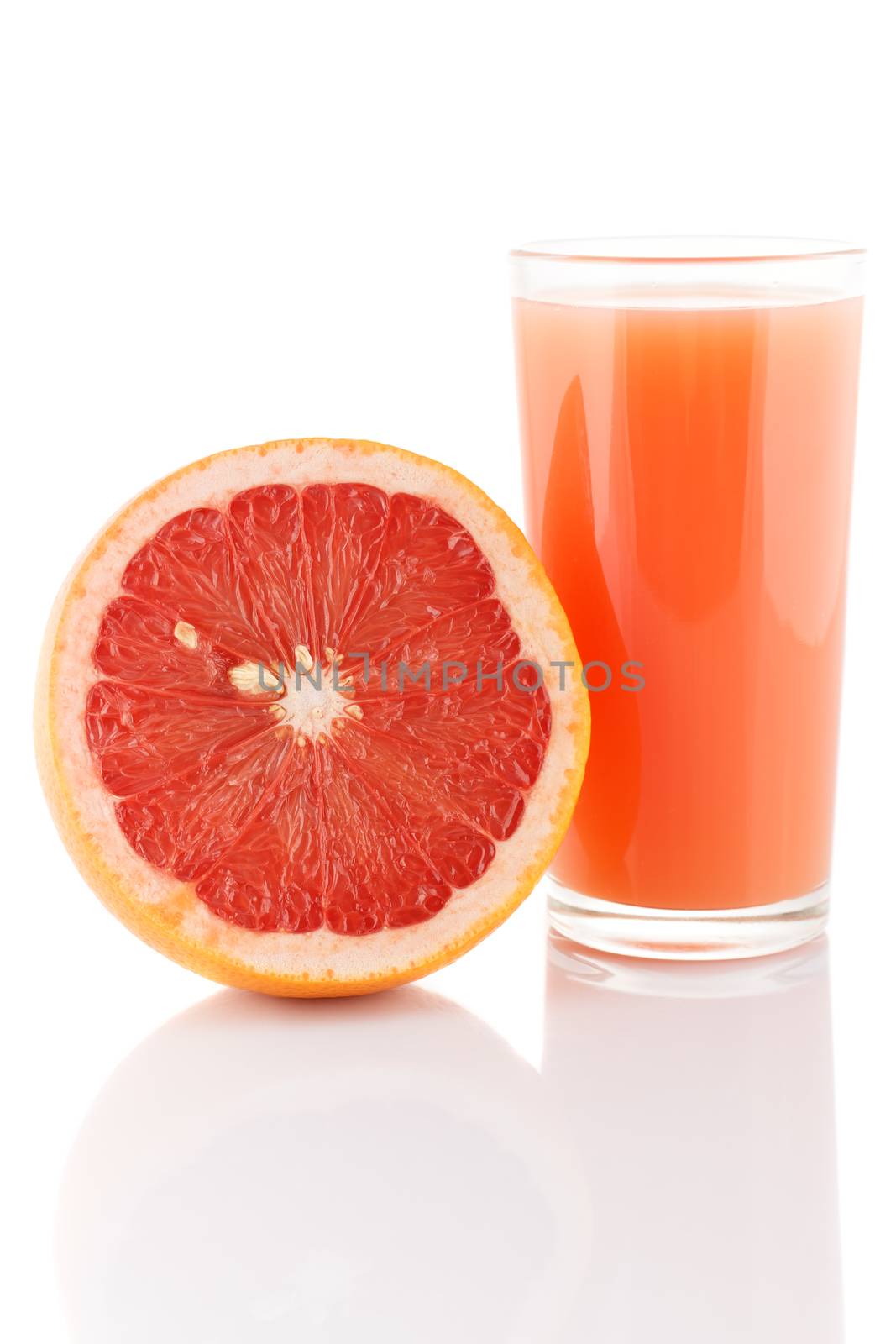 Glass of grapefruit juice  by baronvsp