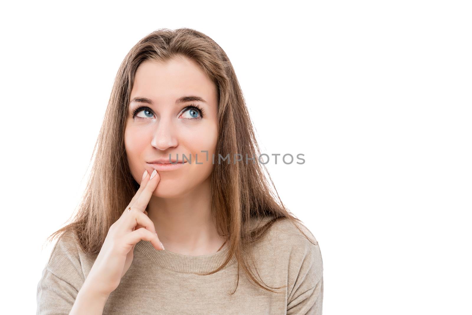 portrait of a pensive dreamy girl on a white background