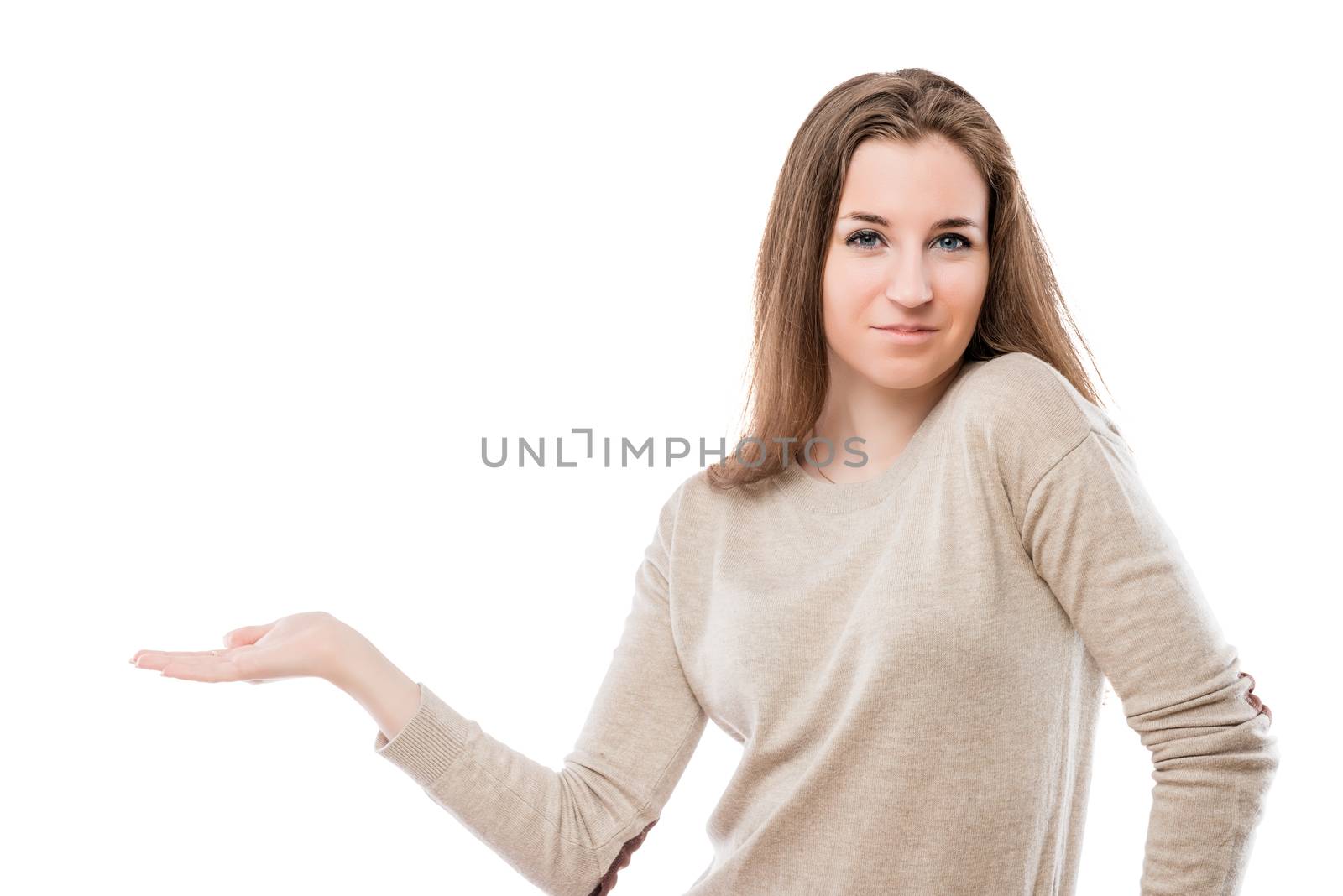 beautiful girl holds a palm on a white background, space on the left