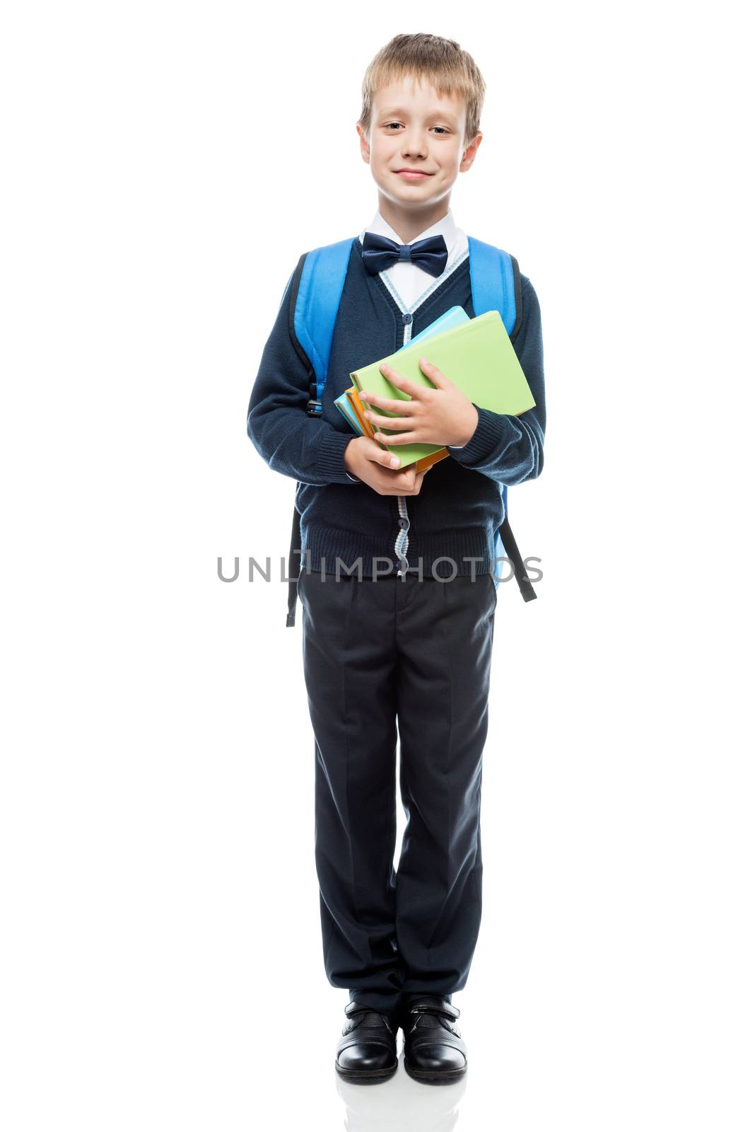 portrait of a schoolboy with books on a white background in stud by kosmsos111