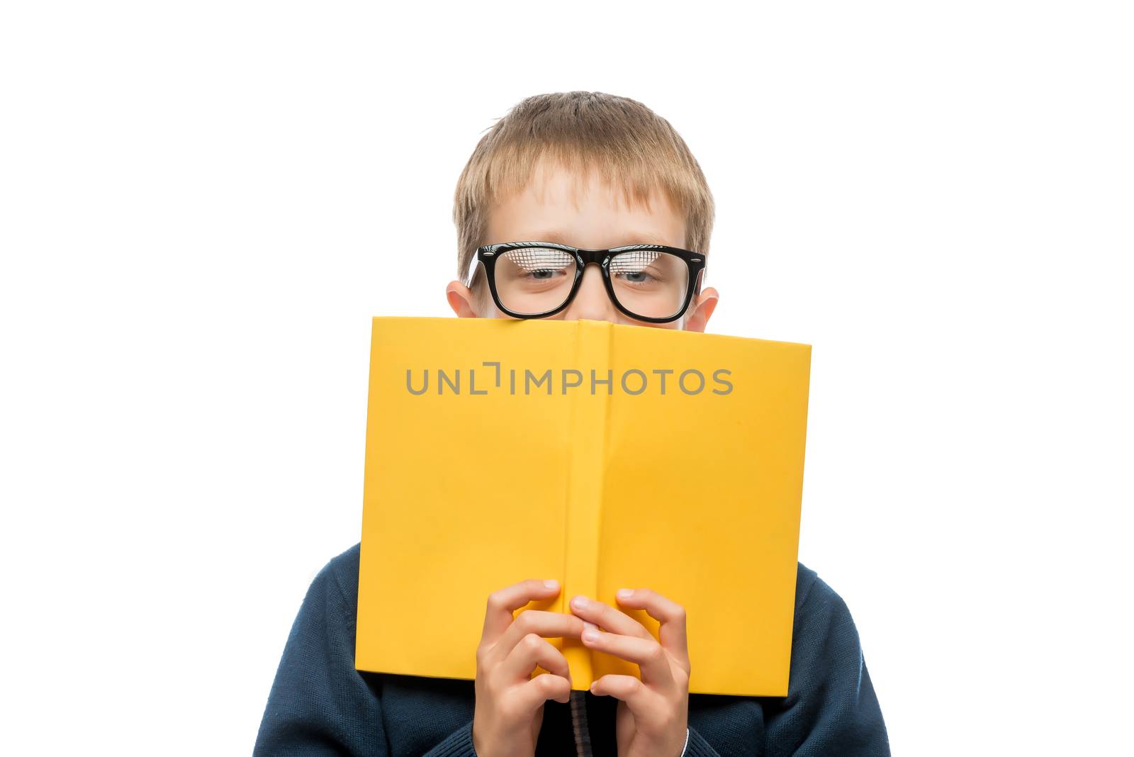 close-up portrait of a schoolboy wearing glasses with a textbook by kosmsos111