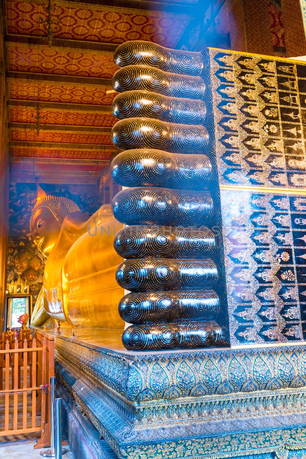 legs lying Buddha in a temple in Thailand, Bangkok by kosmsos111