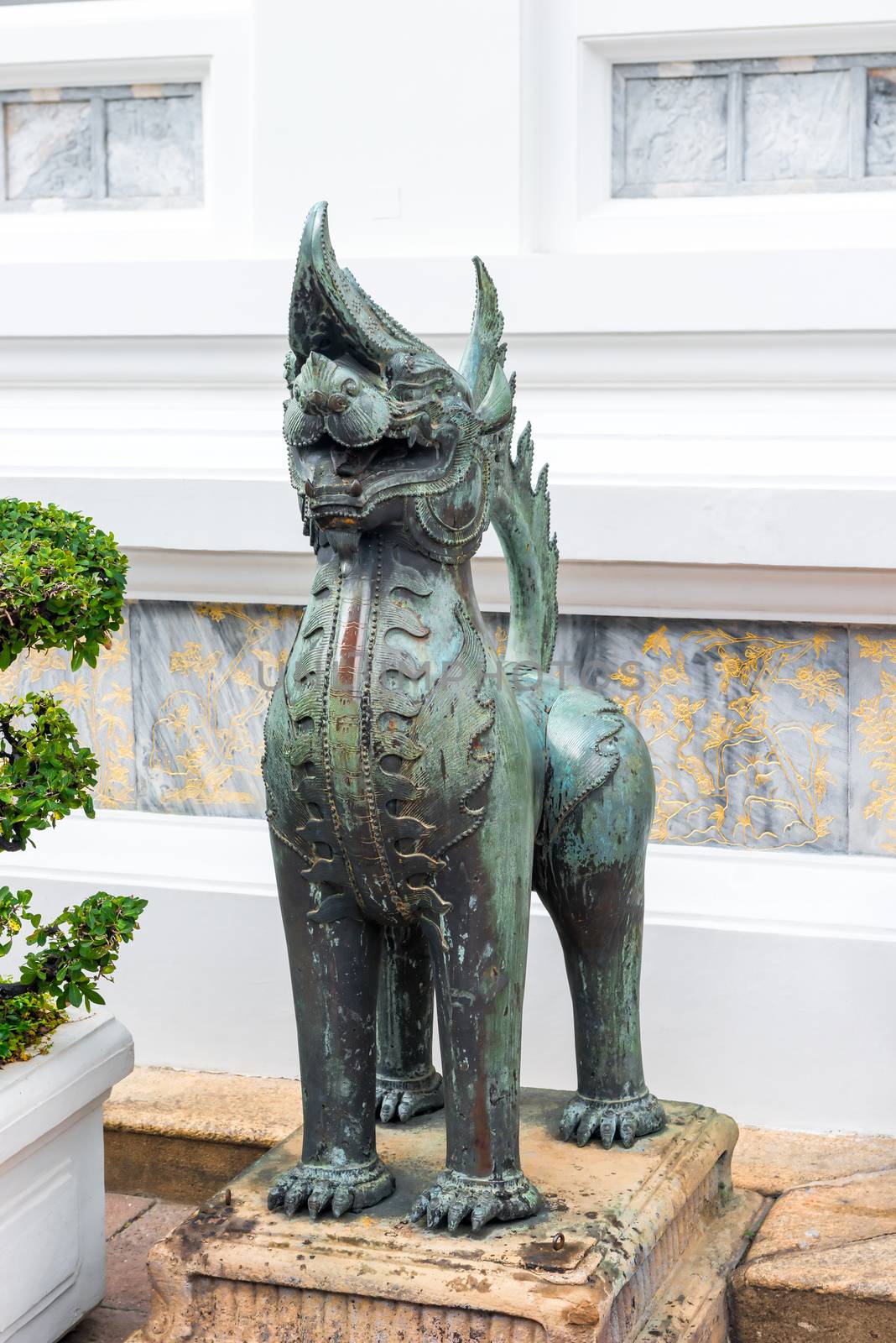 evil guard near the entrance to the temple in the form of an animal