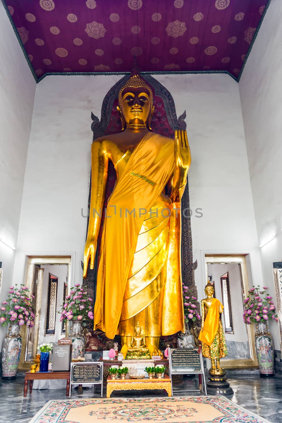 View of the altar in the Buddhist temple of Thailand - the god Buddha on the altar