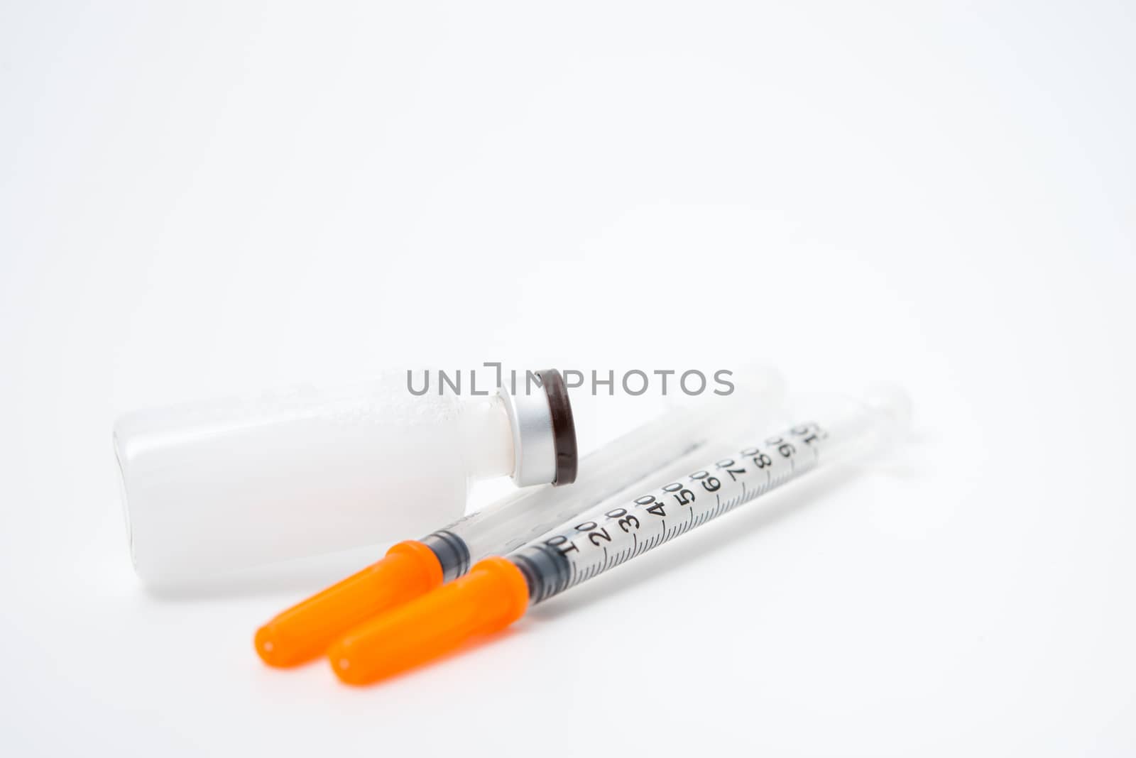 Insulin ampoule with syringe lie by antpkr