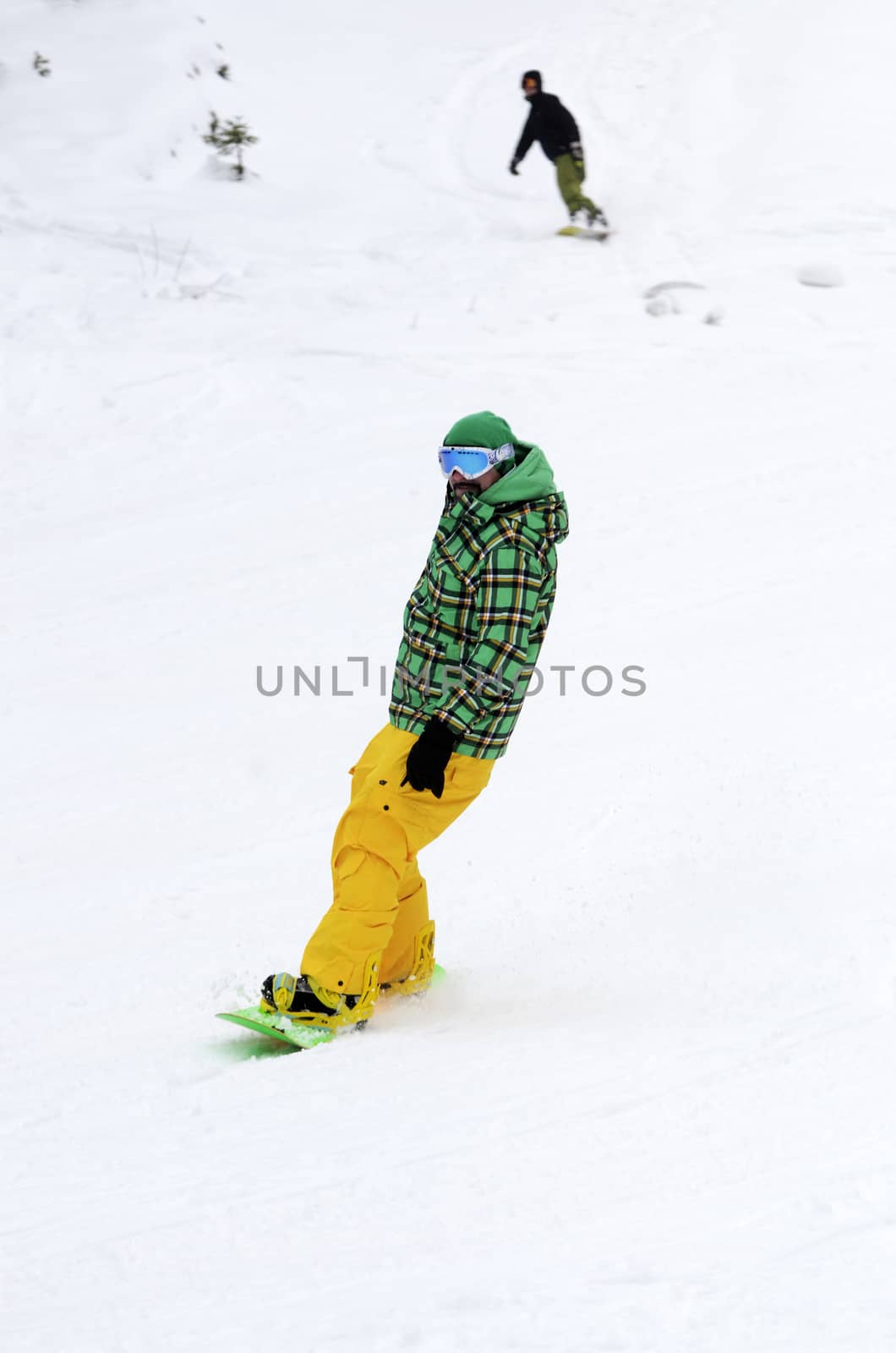 Men skiing on the mountain under snow