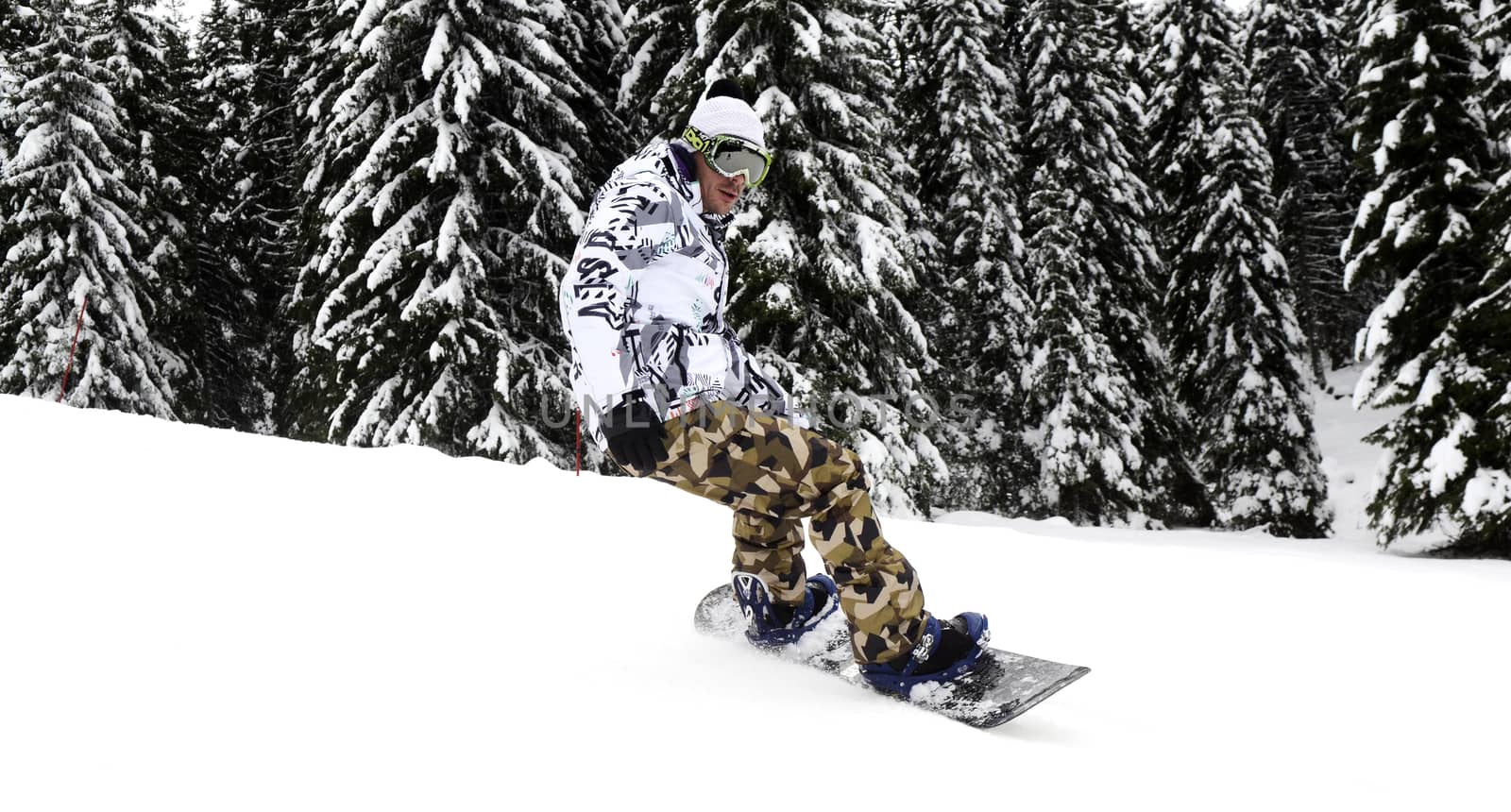 Men skiing on the mountain under snow