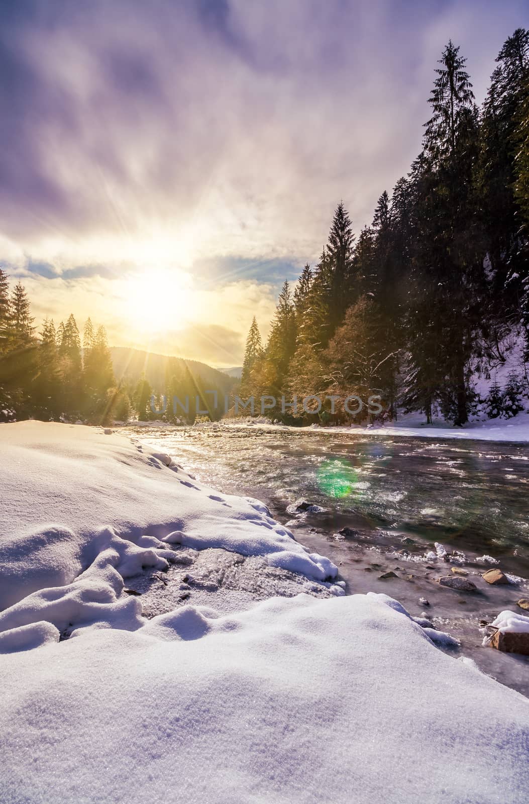 frozen river in forest at sunset by Pellinni