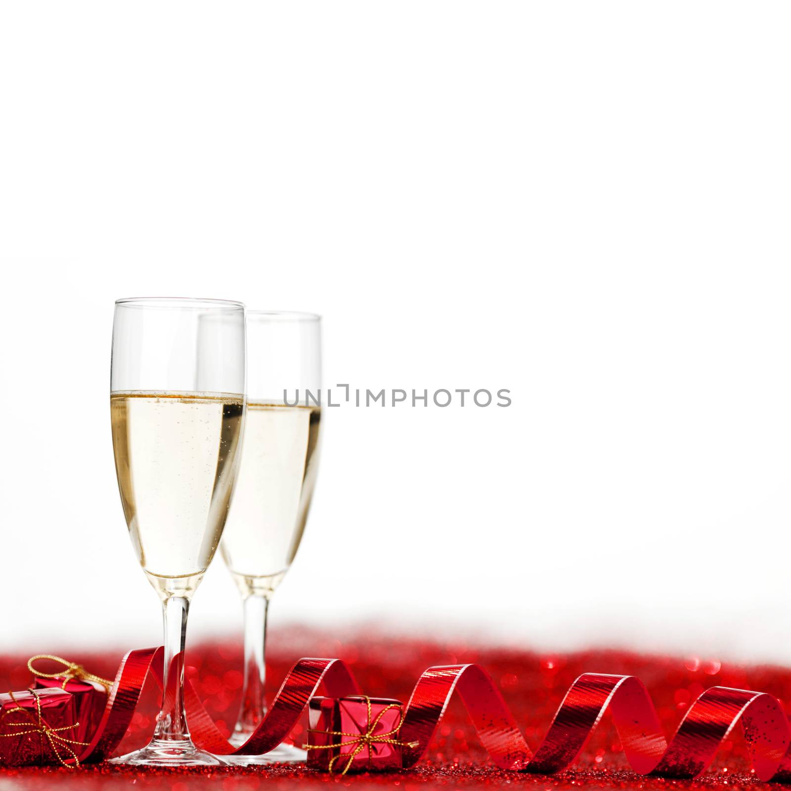 Two glasses of champagne with red decor, Valentines day concept