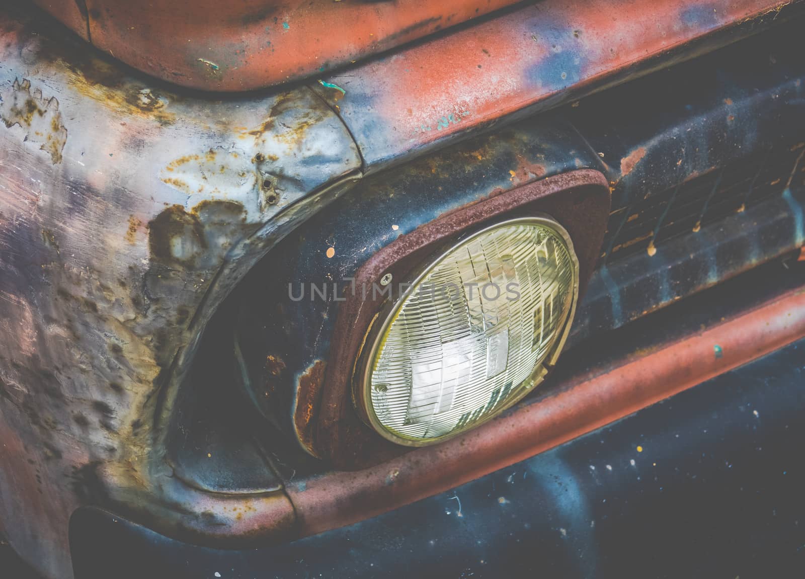 Detail Of The Headlight Of A Rusty Old Vintage Truck