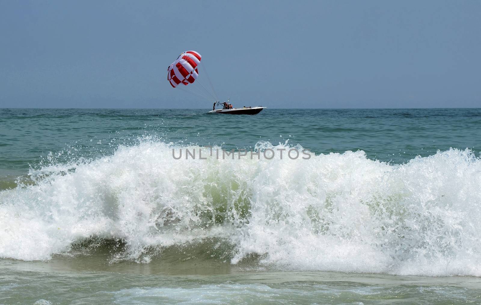 Waves on the beach on sunny summer day