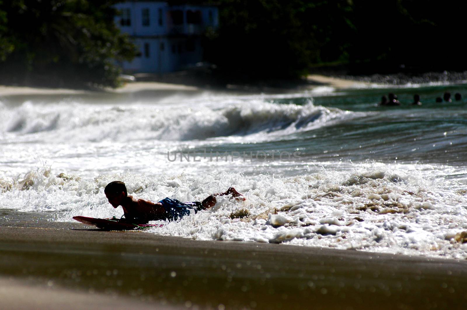Waves on the beach on sunny summer day