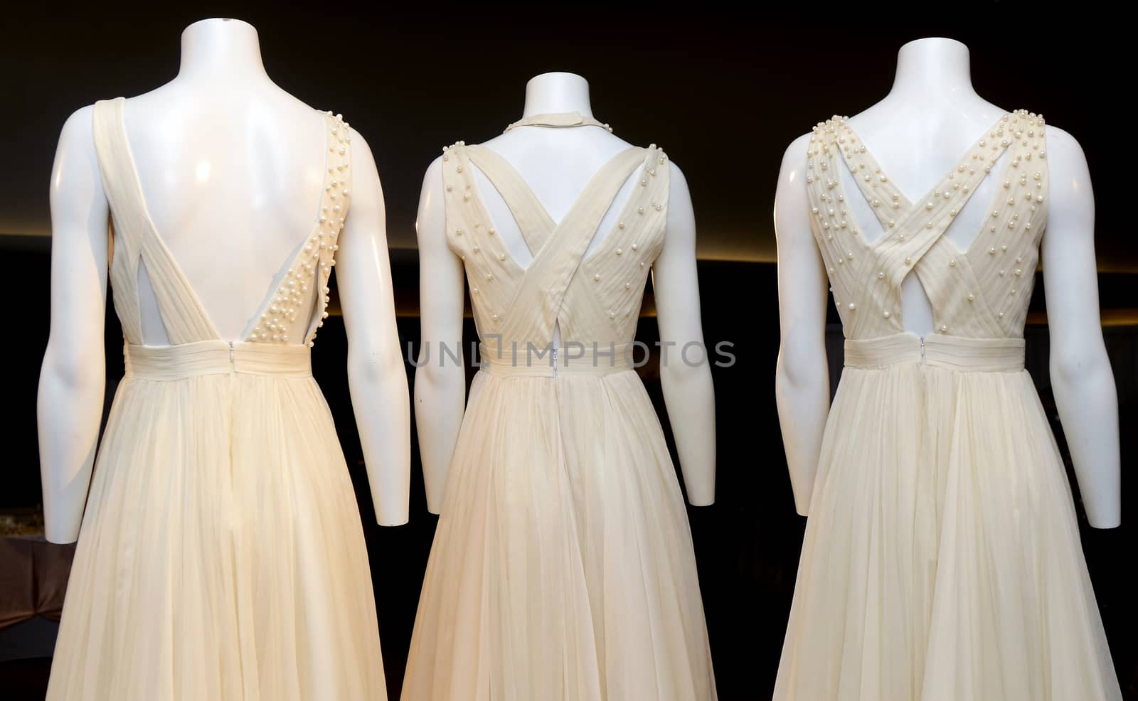 Elegant White wedding dress on doll model