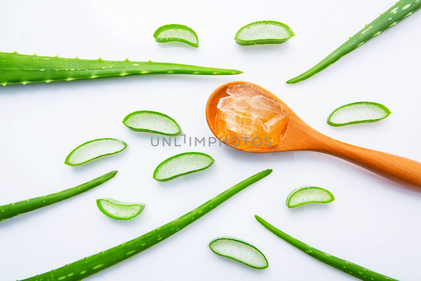 Aloe vera fresh leaves with slices and aloe vera gel on wooden s by Bowonpat