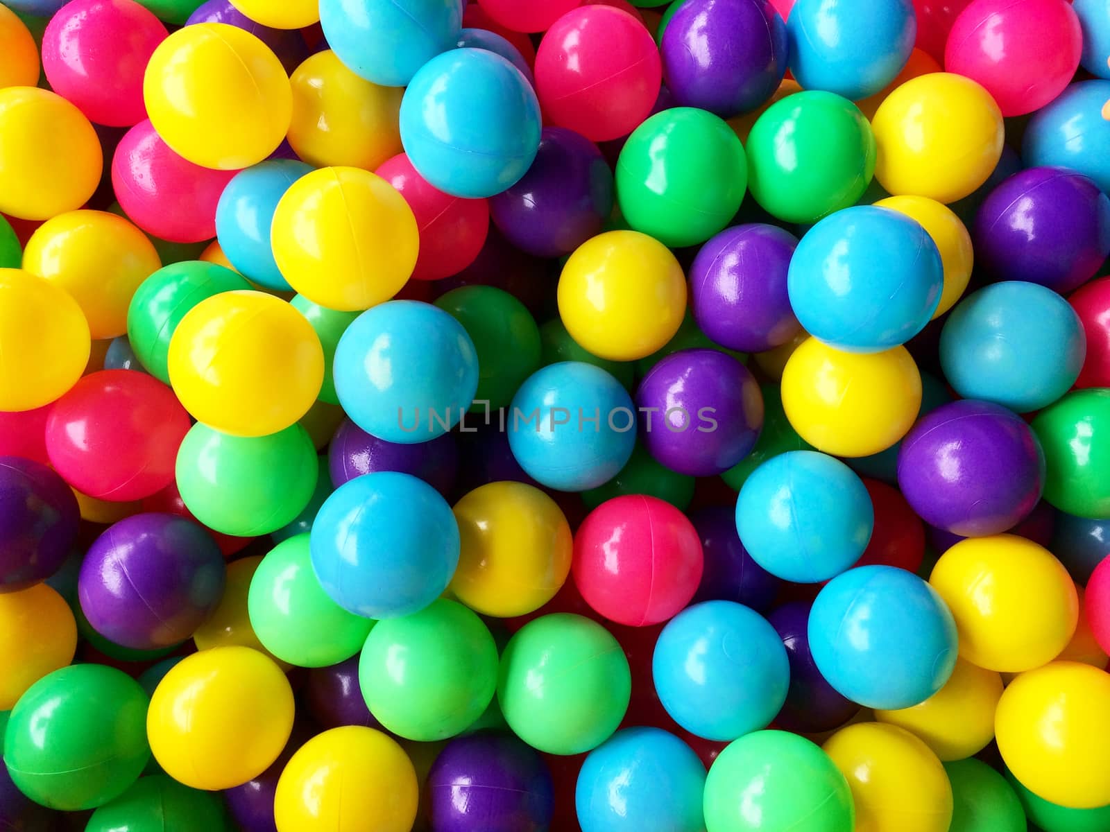 dry children's pool with colorful balls