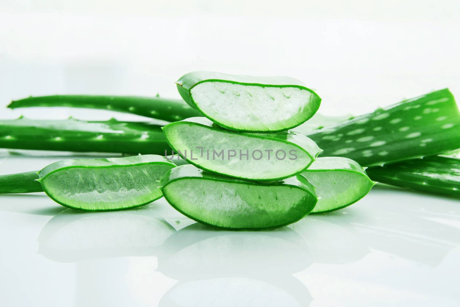 Aloe vera fresh leaves with slices aloe vera gel. isolated over  by Bowonpat