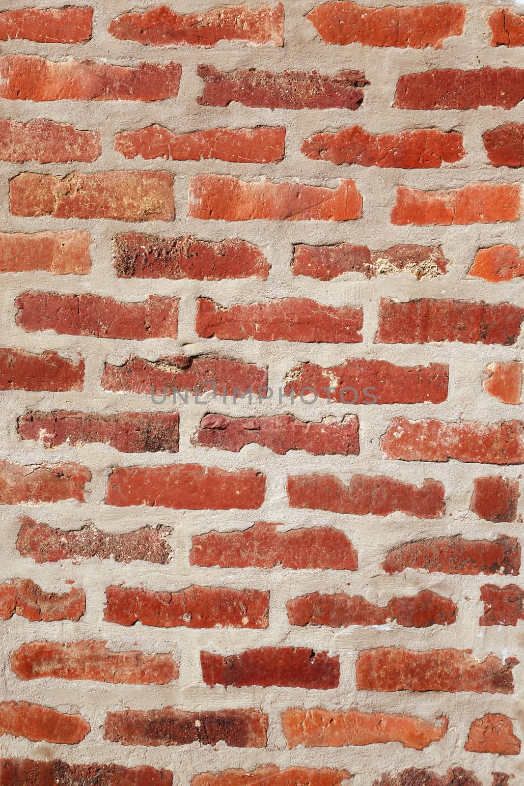 Old orange brick wall texture background. Wallpaper