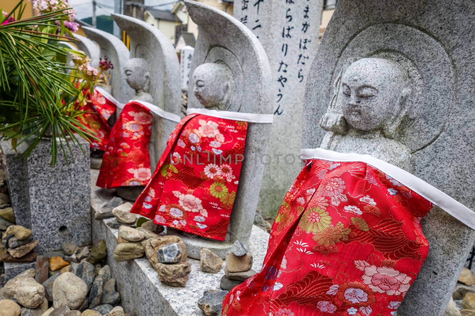 Jizo statues in Arashiyama temple, Kyoto, Japan by daboost