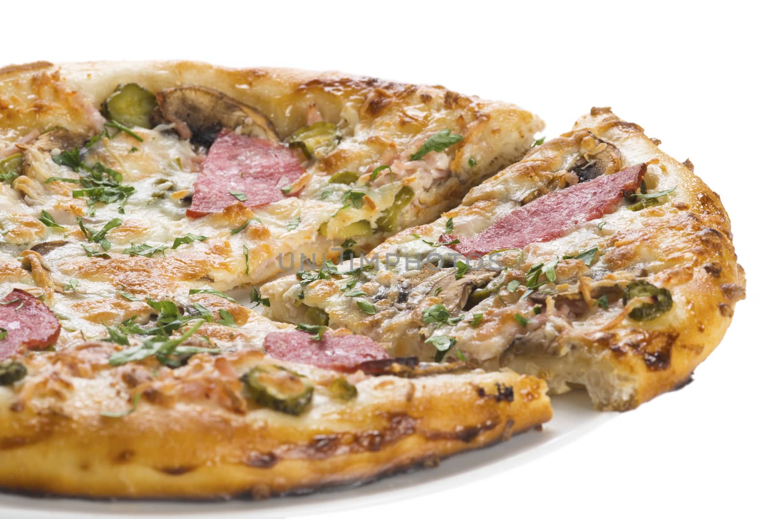 Tasty pizza with sausage, mushrooms and cucumber, isolated