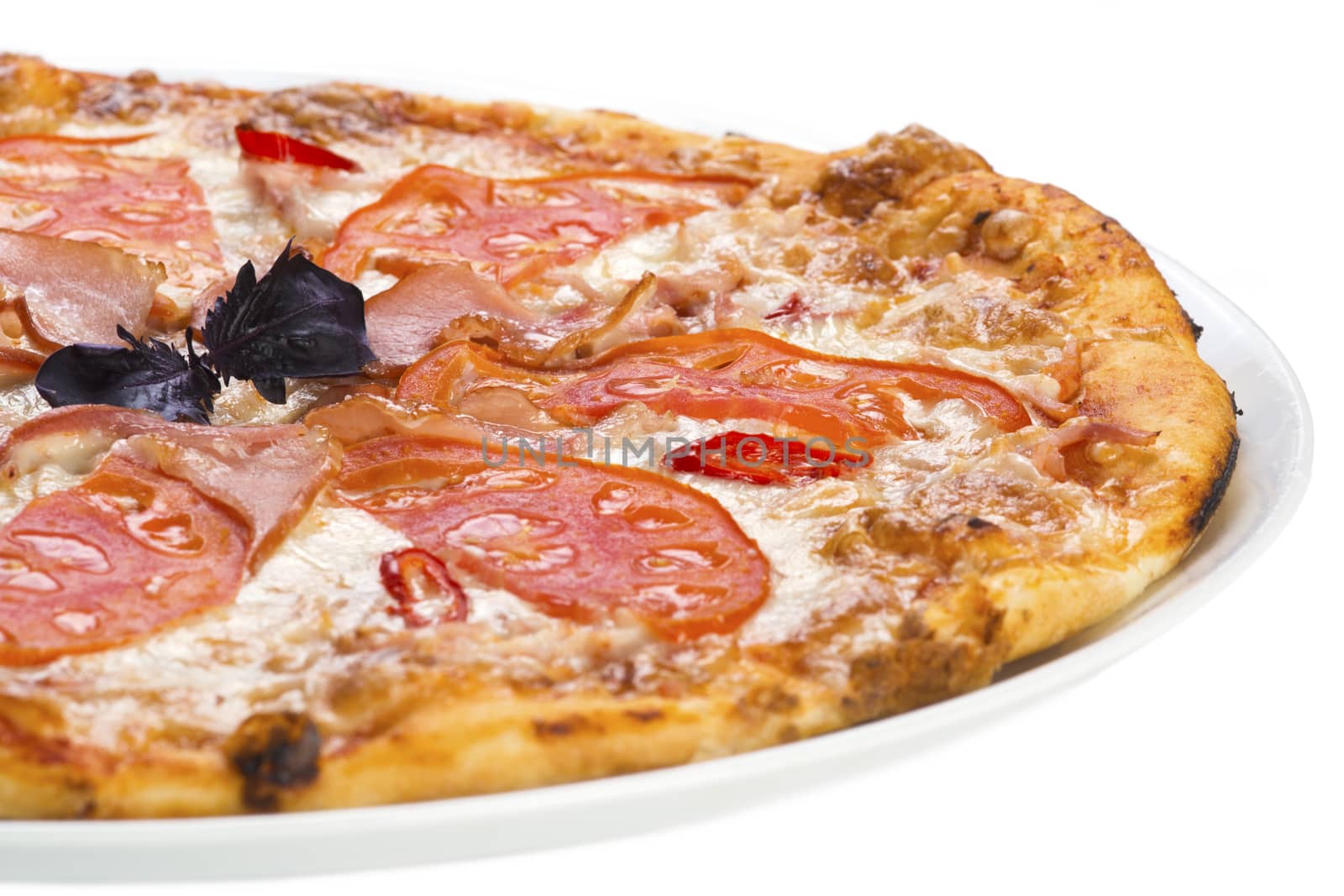 Tasty pizza with ham and tomato by kzen