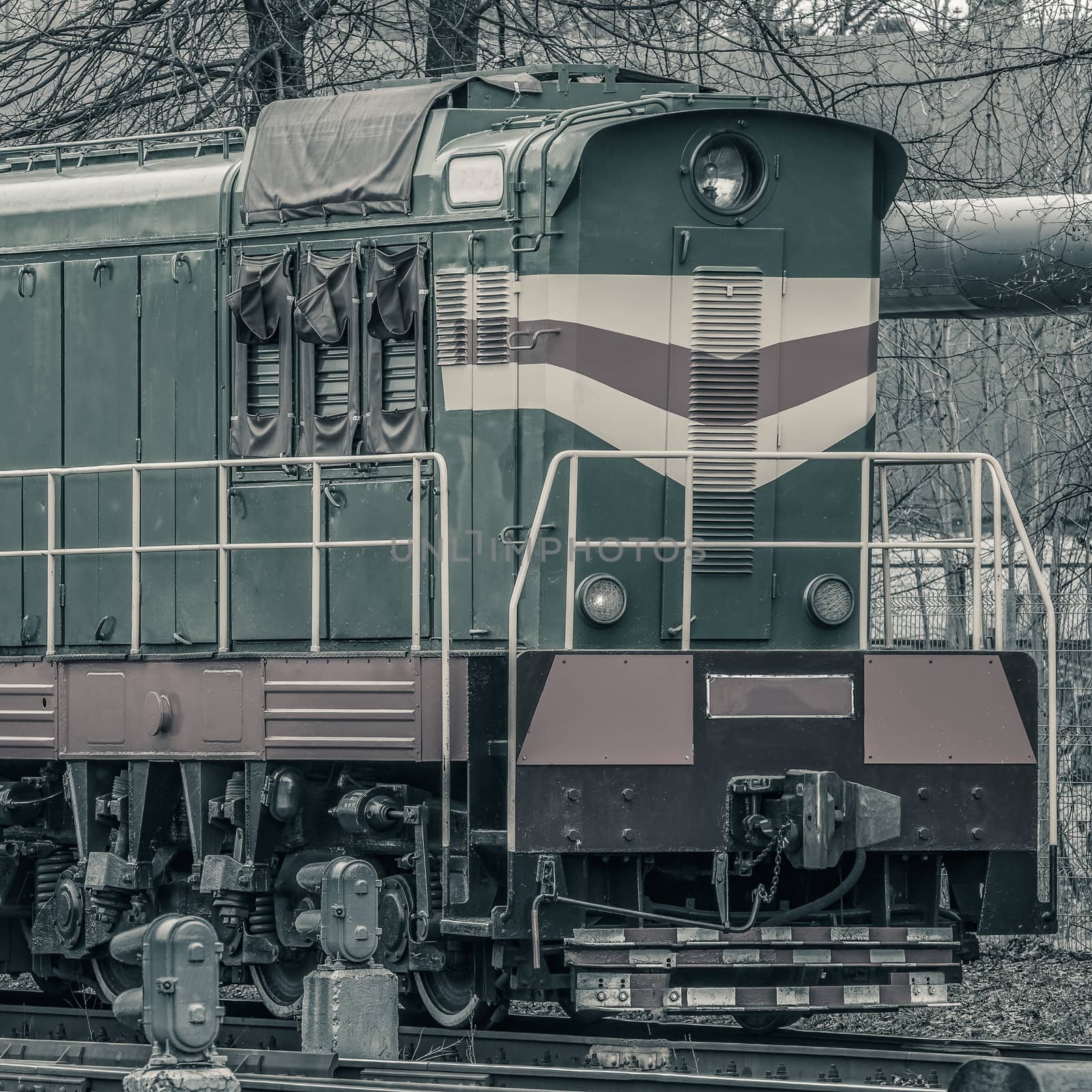 Old diesel cargo locomotive. Freight train in action