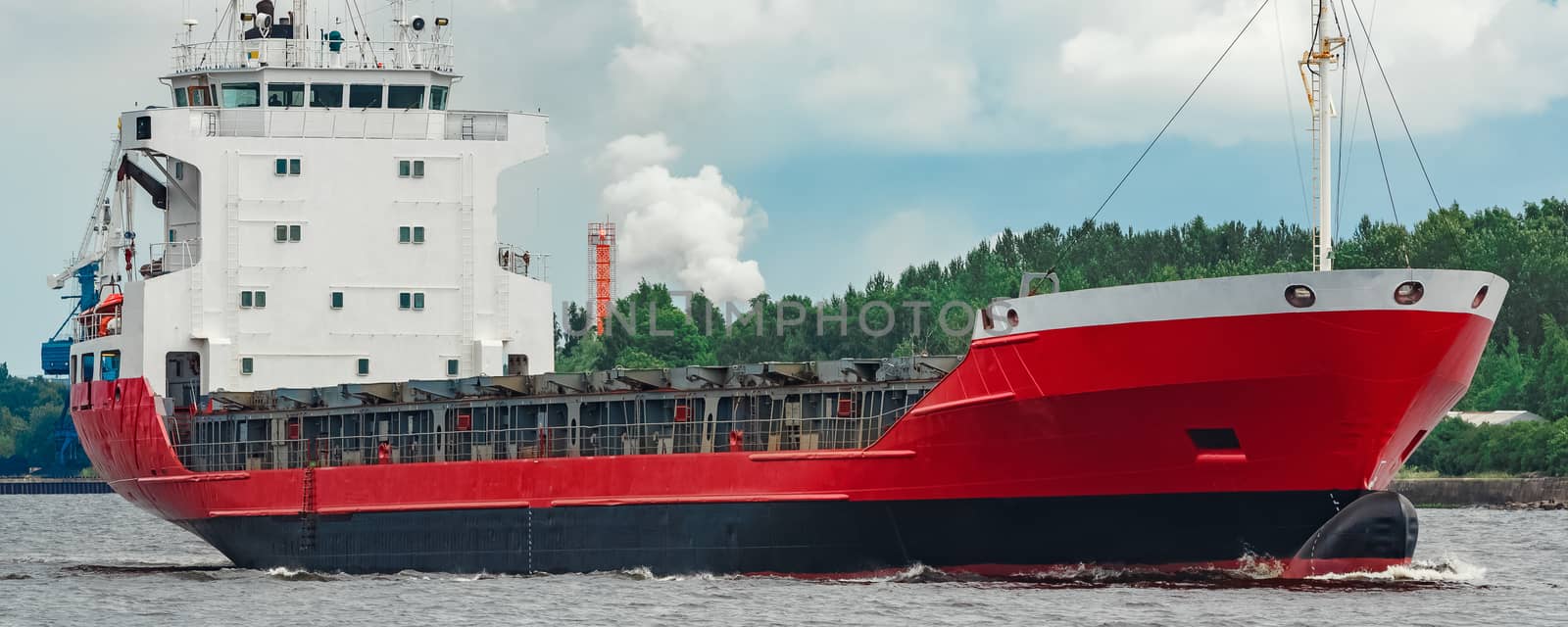 Red new cargo ship moving abroad. Product export in Europe