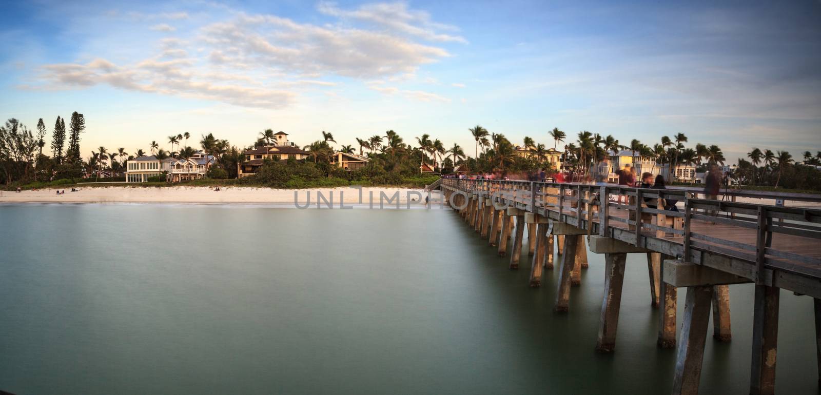 Naples Pier on the beach at sunset by steffstarr