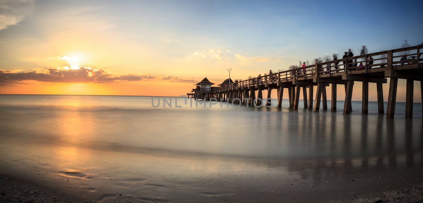 Naples Pier on the beach at sunset by steffstarr