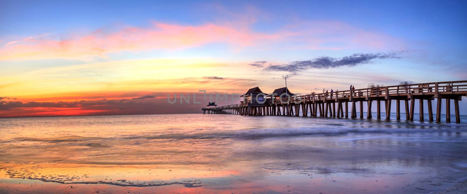 Naples Pier on the beach at sunset by steffstarr