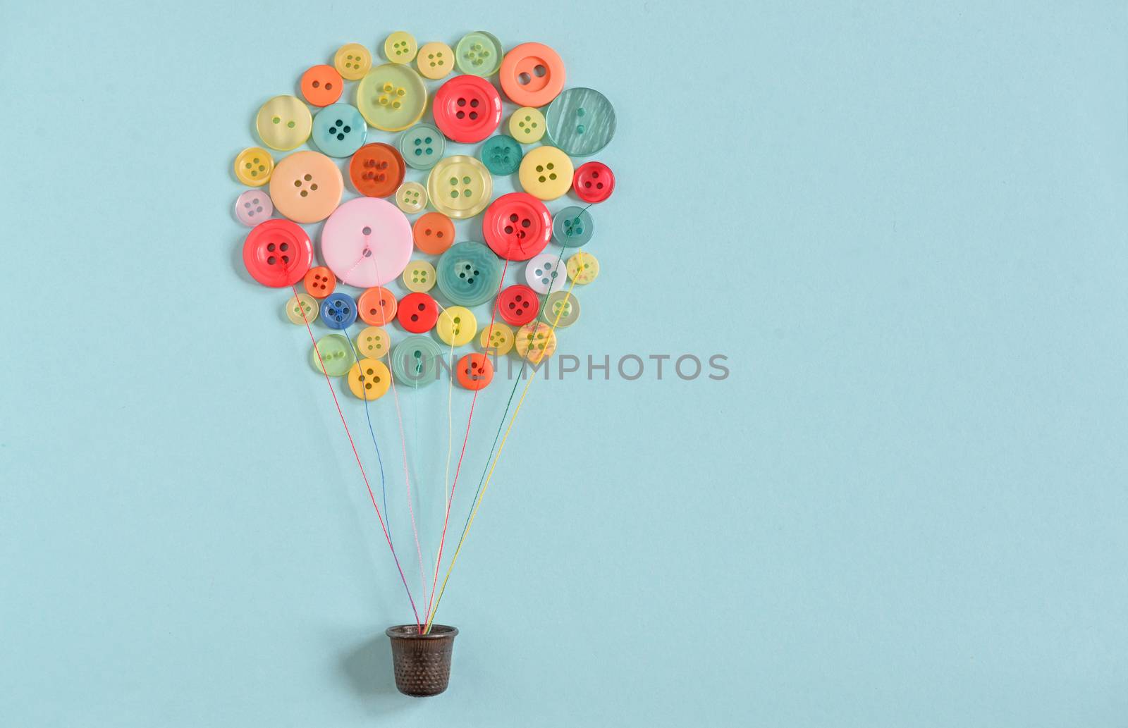 Concept Hot air balloon from colorful sewing buttons 