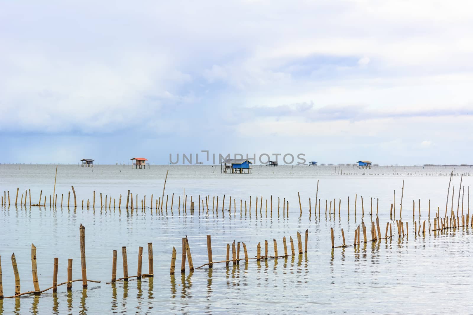 Landscape fishing cottage in sea .