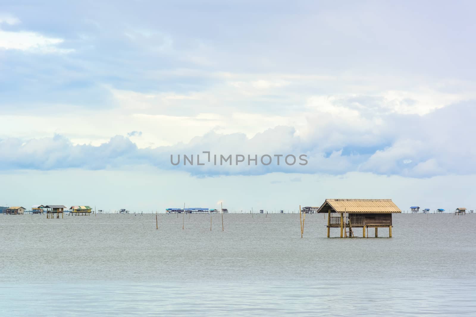 Landscape fishing cottage in sea .