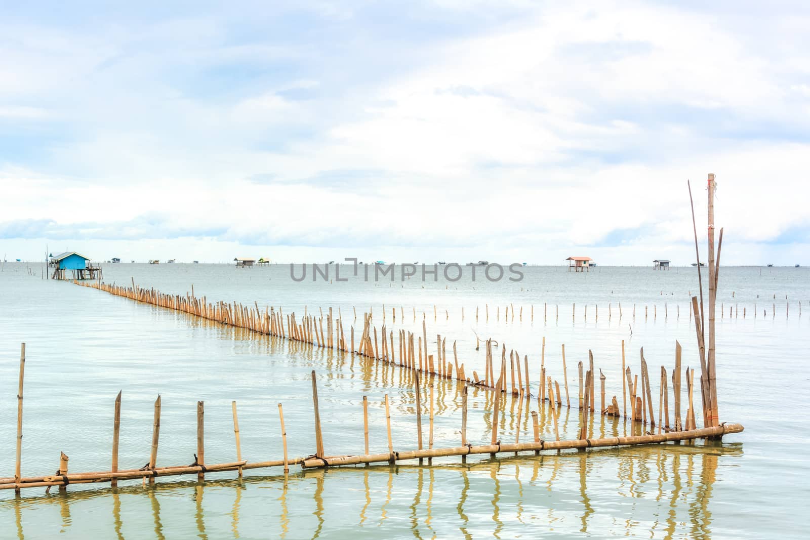 Landscape fishing cottage in sea .