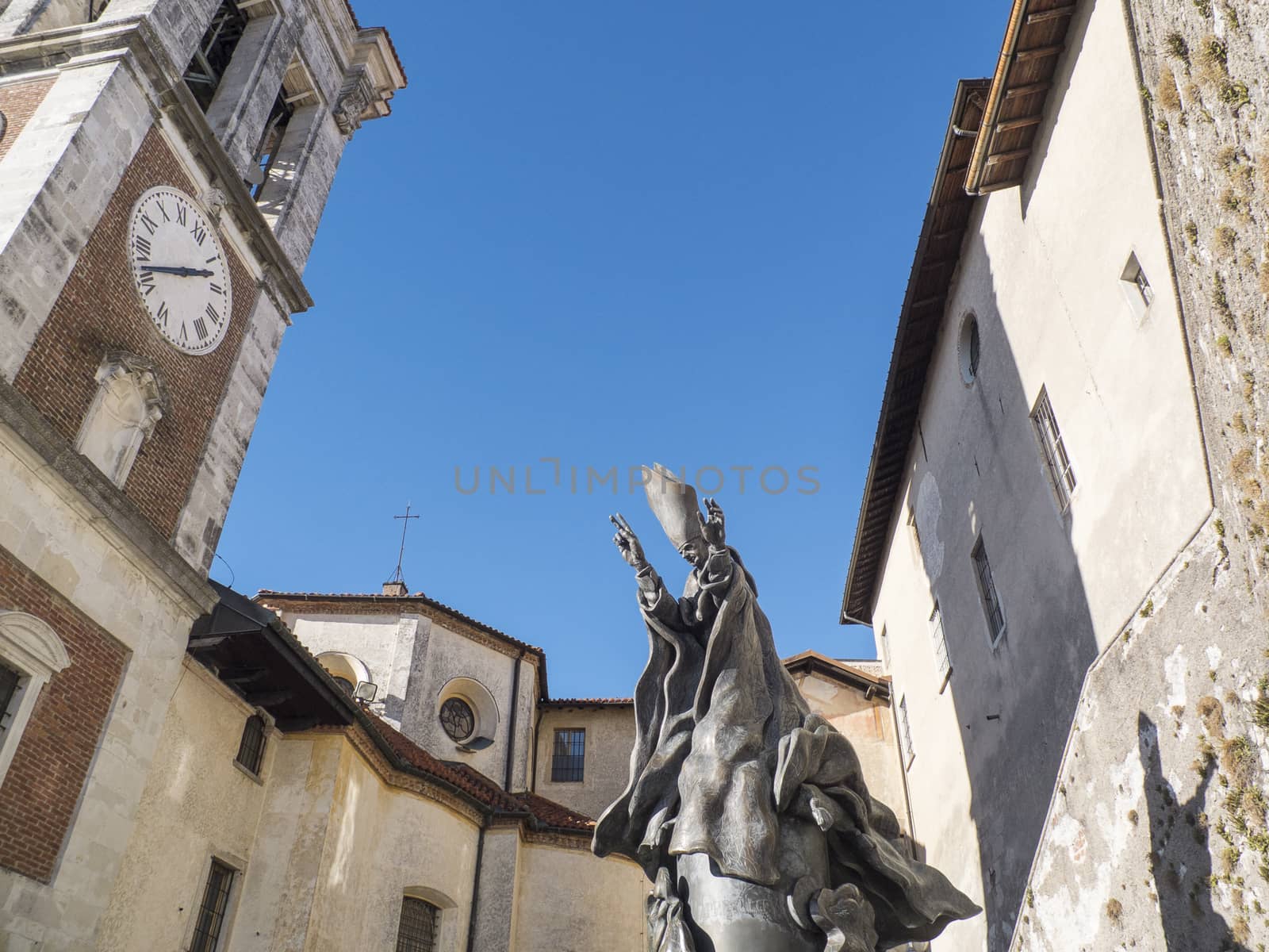 statue of Pope Paul VI to the sacred mountain of Varese, unesco heritage of humanity