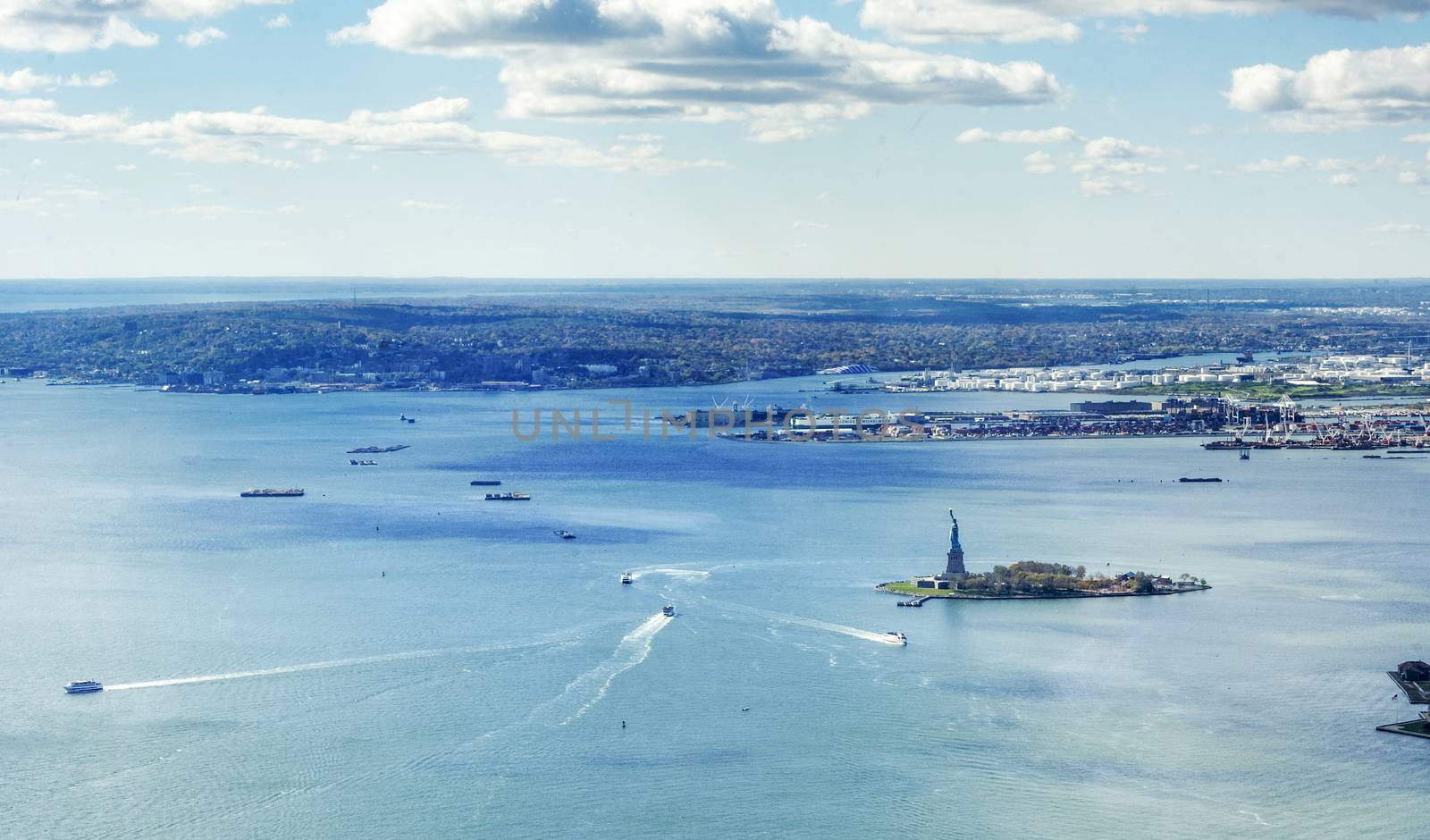 panoramic view of the Upper Bay in New York with Statue of Liberty and Staten Island in the distance