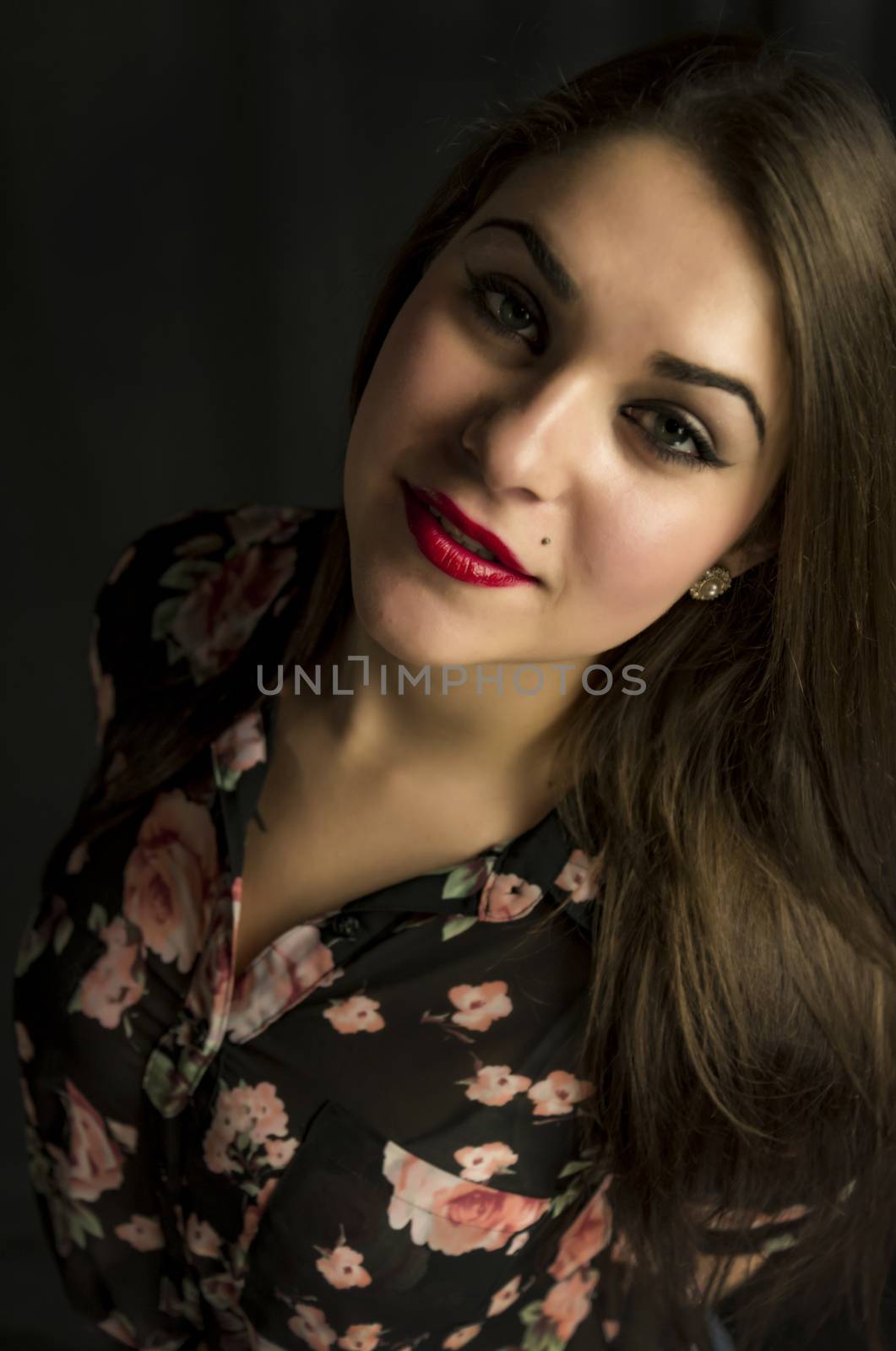 Portrait of beautiful young woman by edella