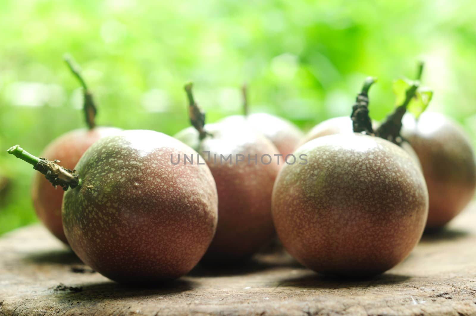 Passion fruit on wooden table.
