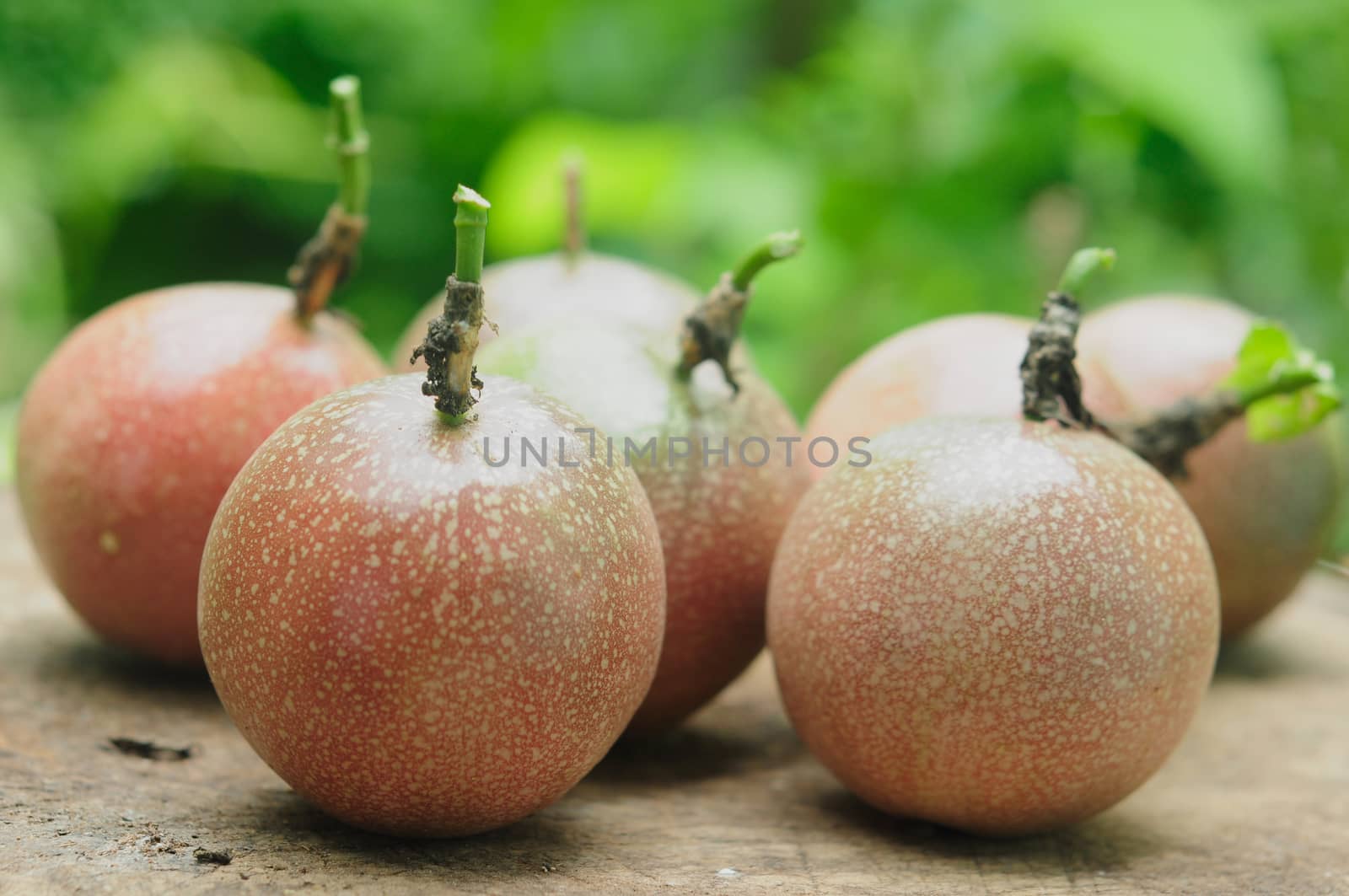 Passion fruit on wooden table.