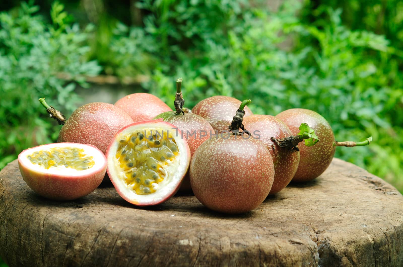 Passion fruit on wooden table.